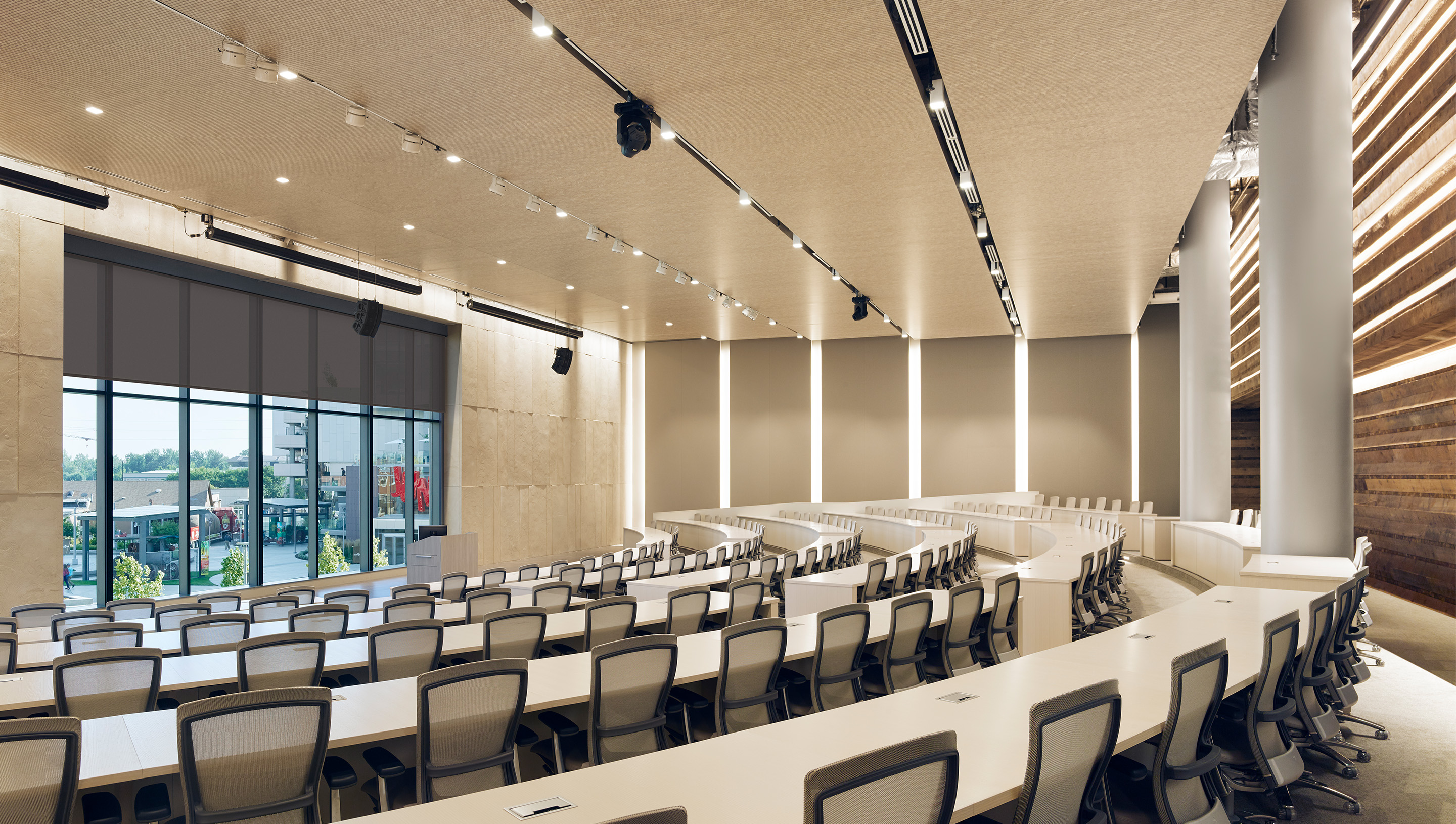 A Boise commercial auditorium with Lutron roller shades.