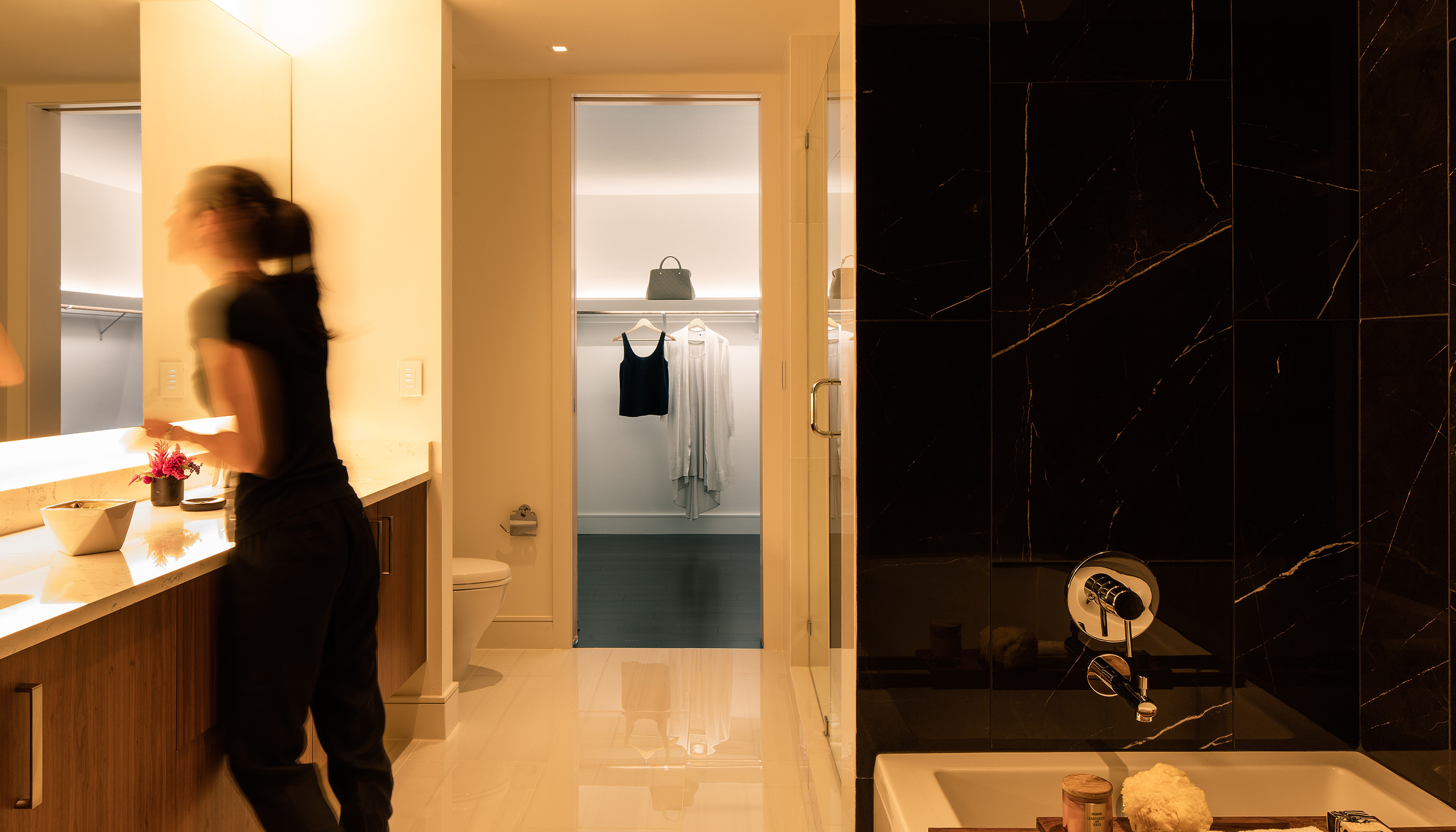 An Austin residential bathroom with Lutron Ketra lights, Palladiom, HomeWorks, Keypads & Remotes