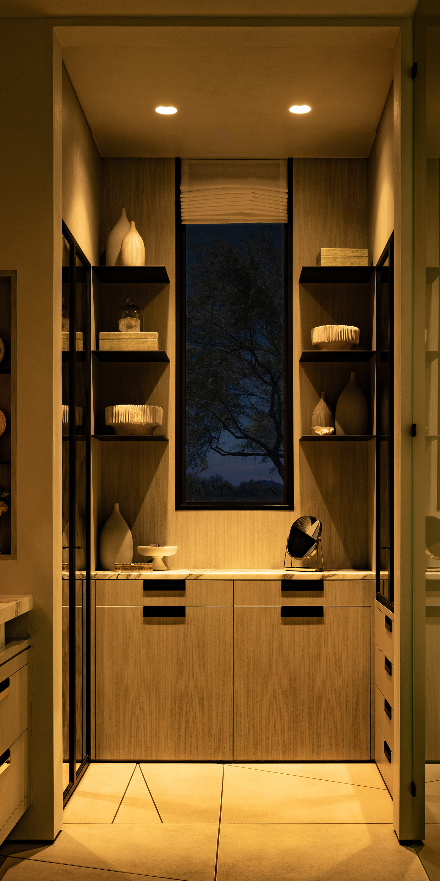 An Austin residential bathroom with Lutron Ketra lights, Roman shades, Sivoia & HomeWorks