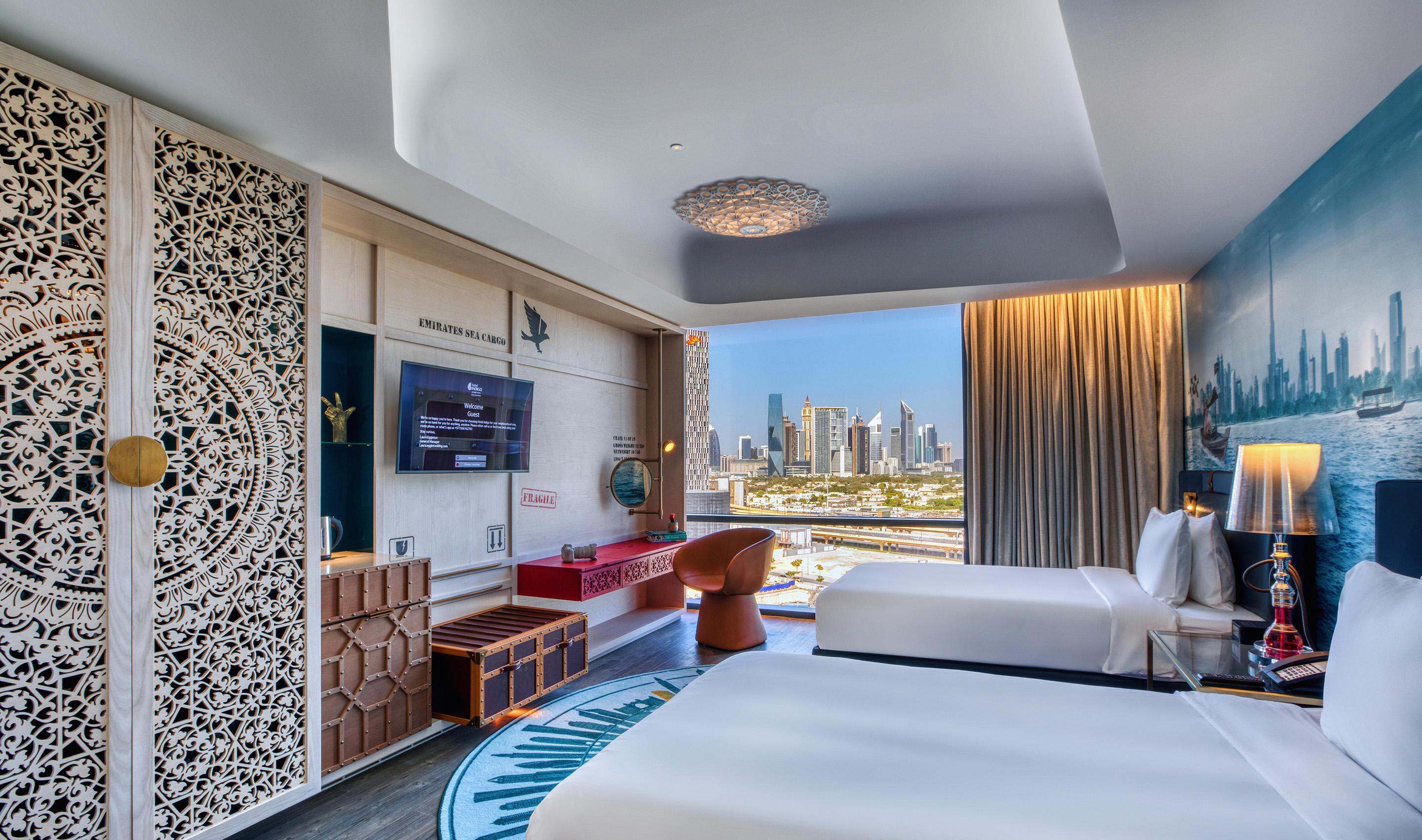 A Dubai hospitality Guest Room with Lutron drapery & myRoom XC.