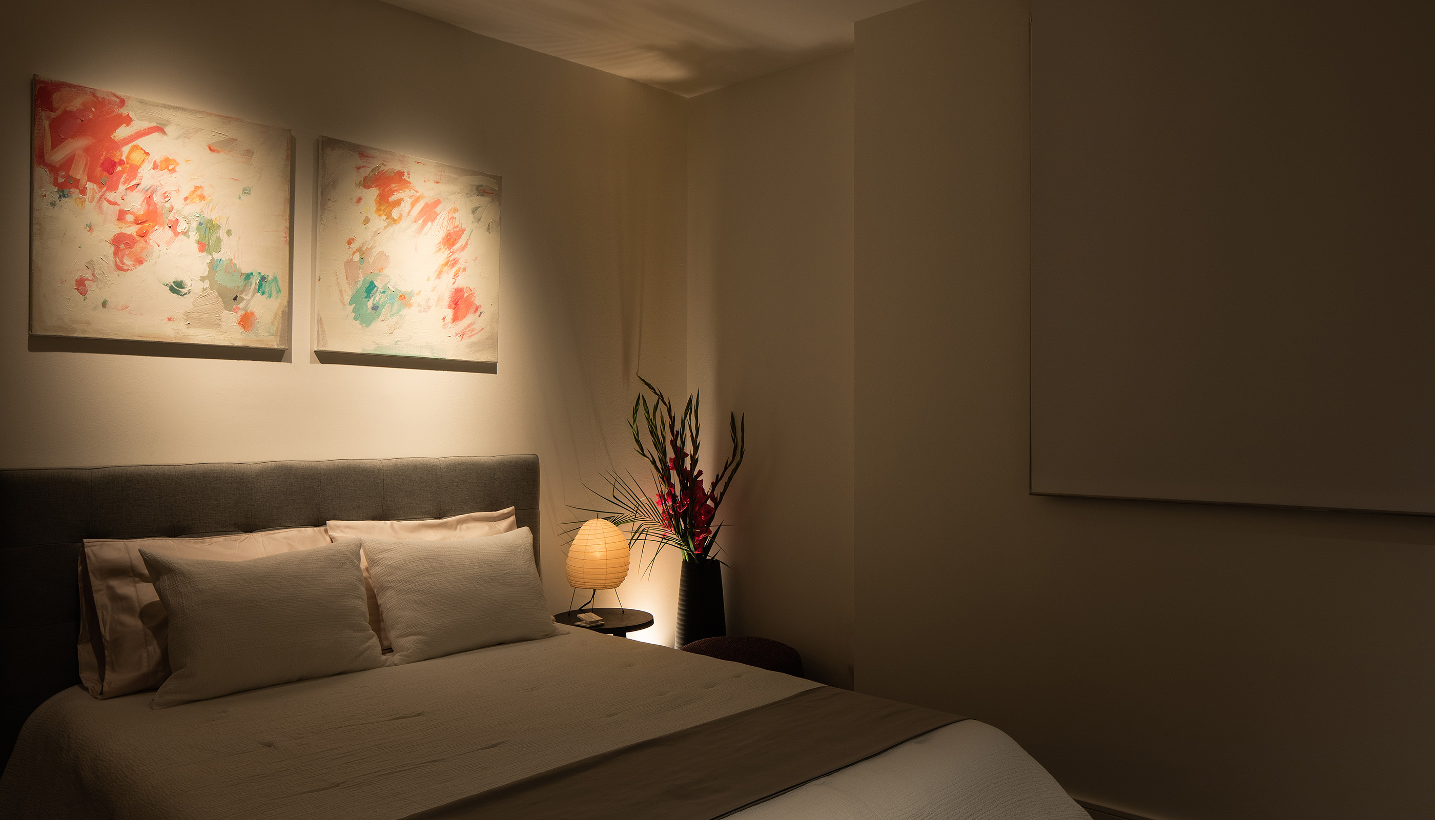 An Austin residential bedroom with Lutron Ketra lights and HomeWorks