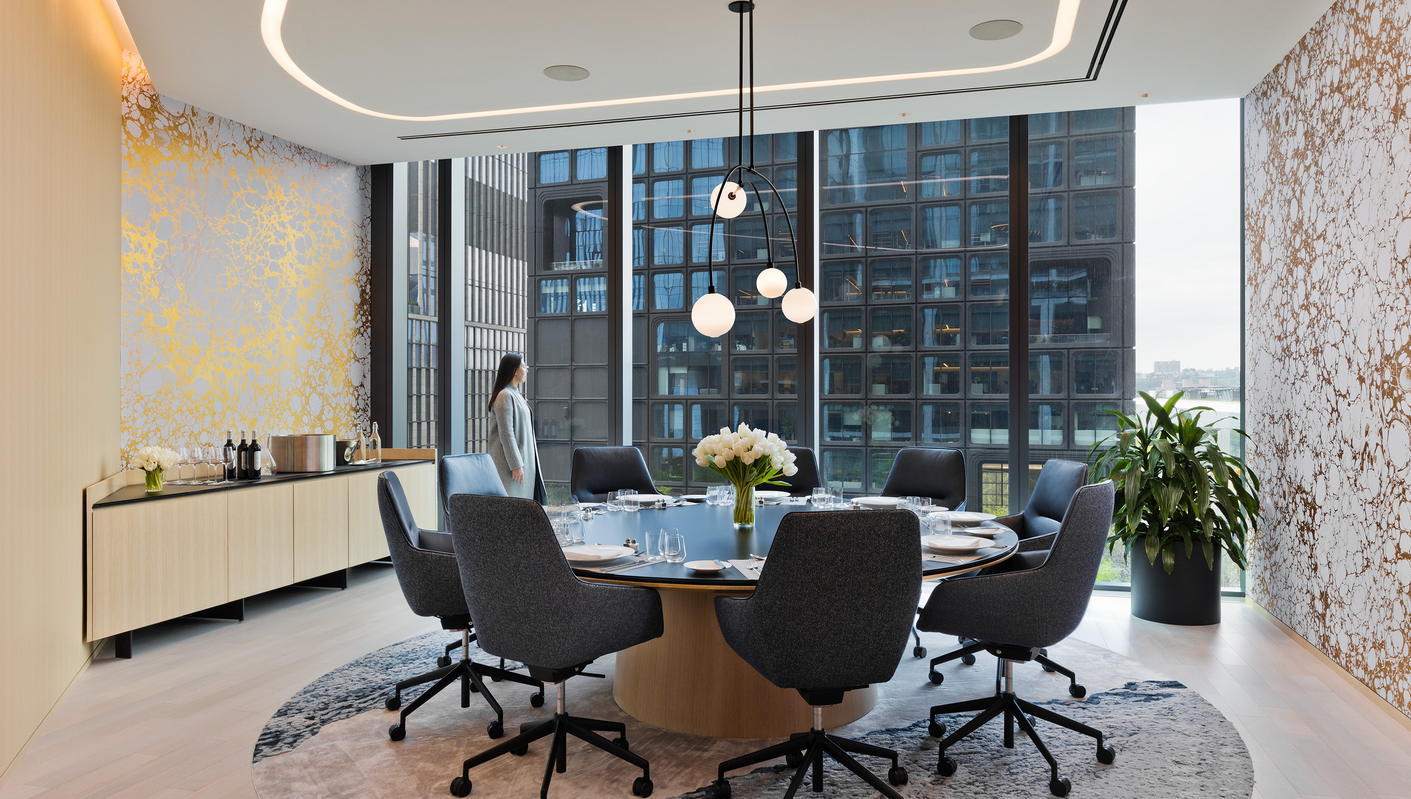 A New York City commercial meeting room with Lutron embedded fixture technology and Athena.