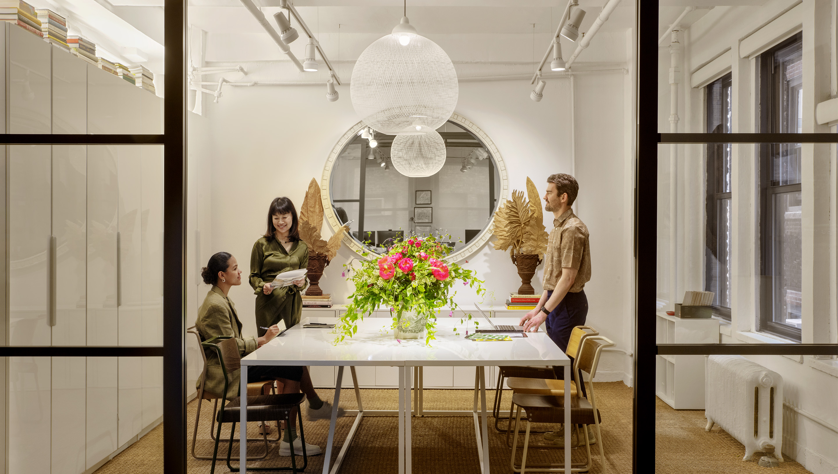 A New York City commercial meeting room with Ketra Rollers Shades, Sivoia.