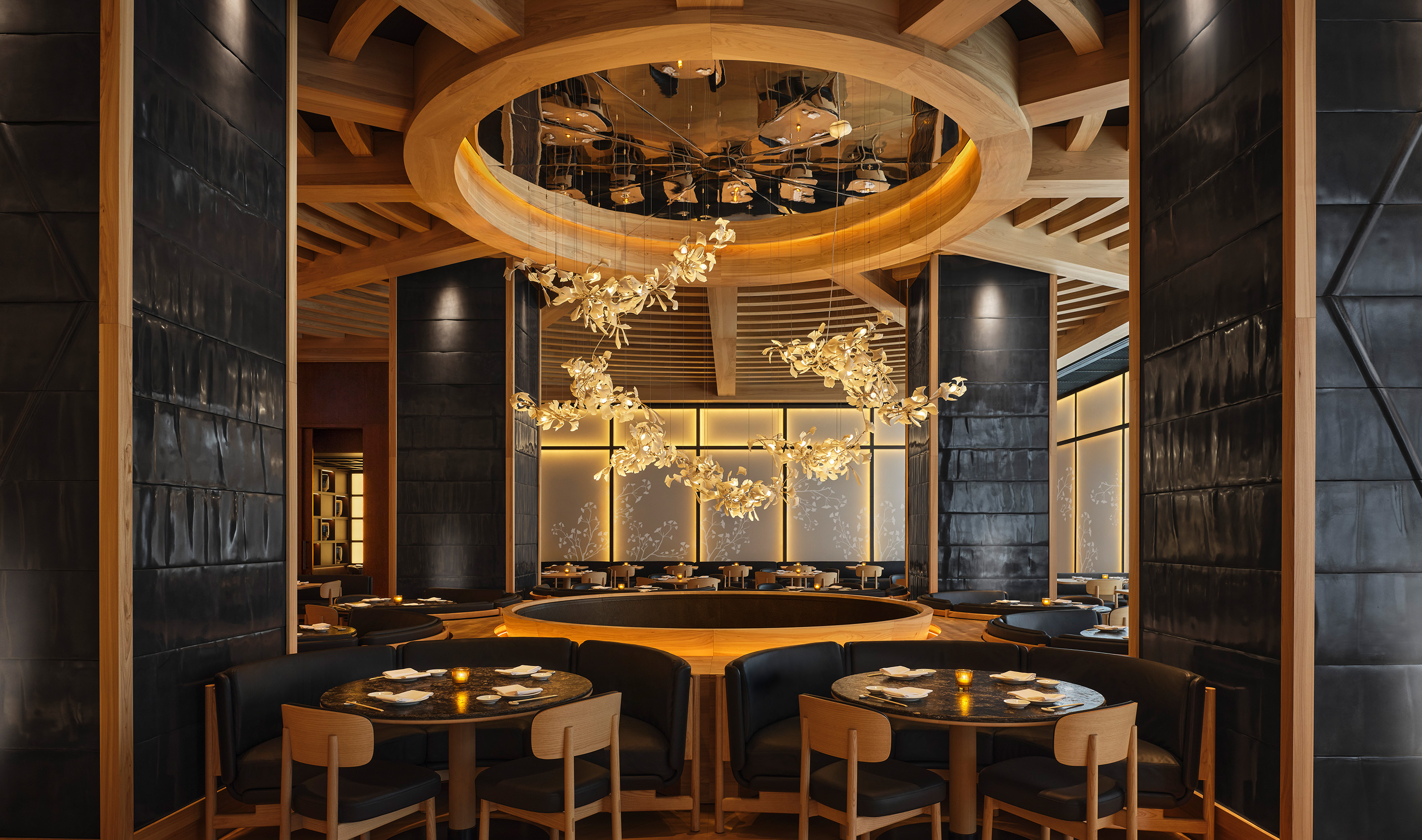 A Canada hospitality dining & social space with Lutron Sivoia and roller shades. © Joel Esposito