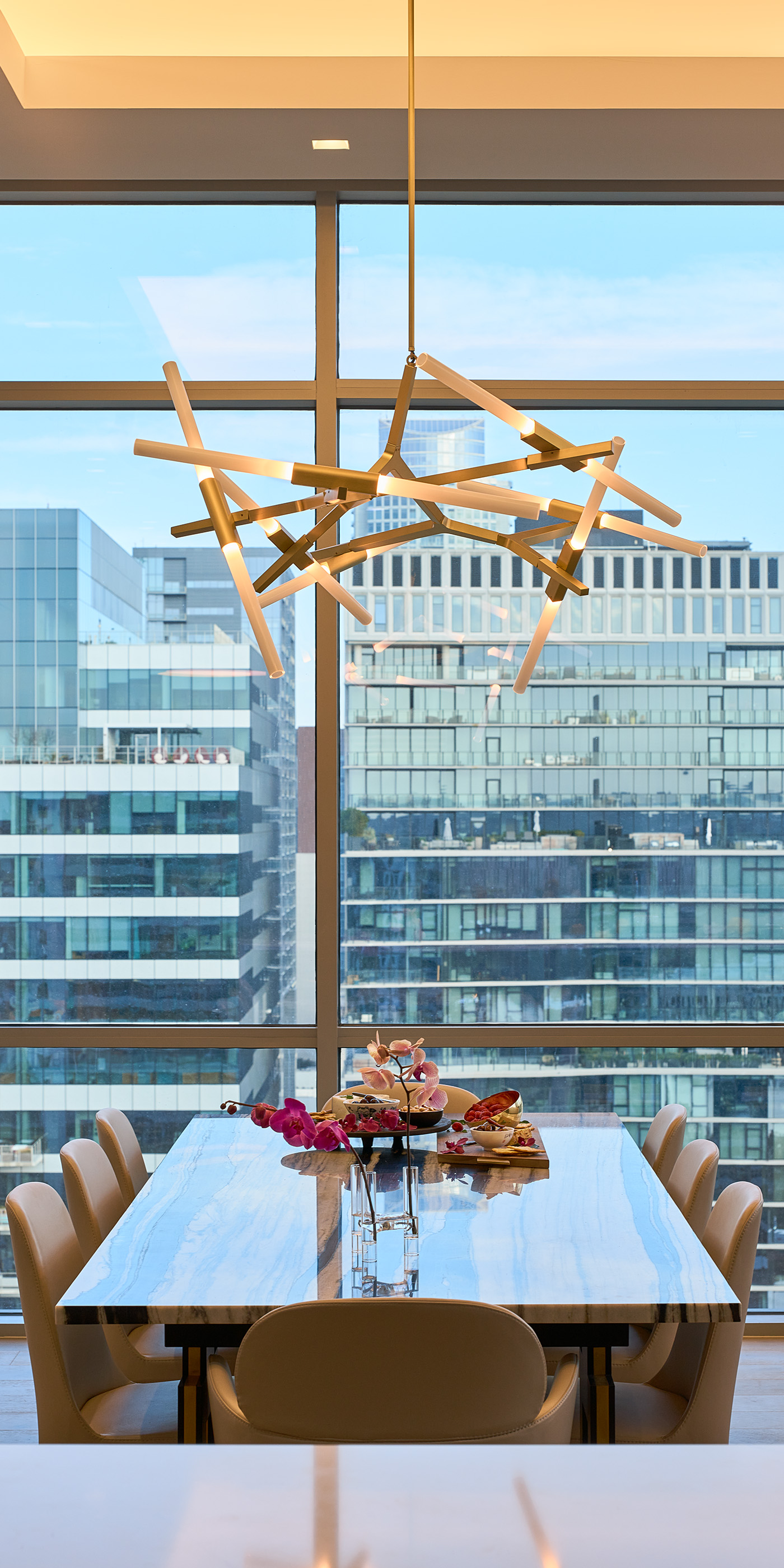 An Austin residential dining room with Lutron Ketra downlights, Palladiom & HomeWorks.