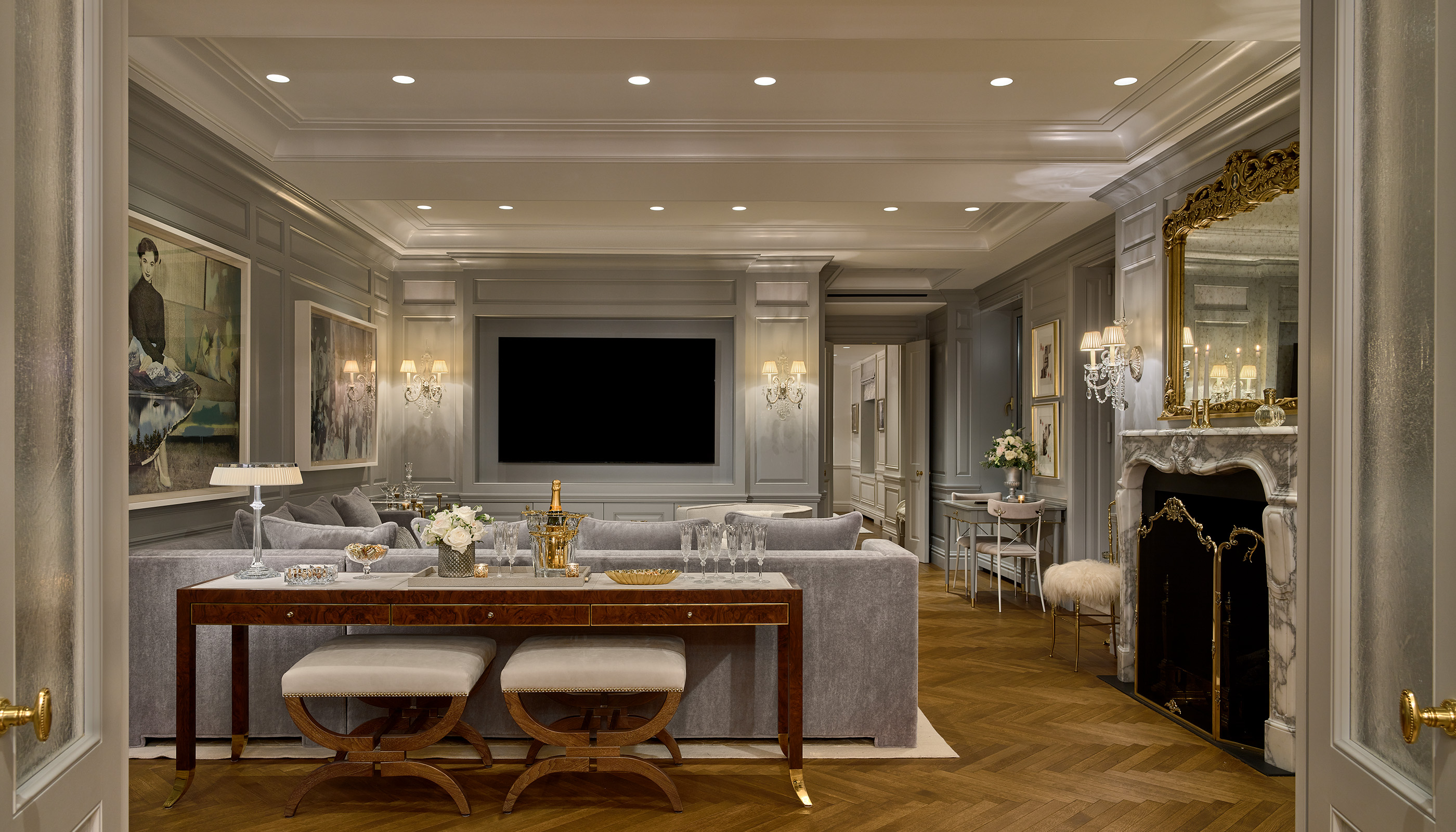 A New York City residential living room with Lutron downlights, Roller shades, Sivoia and HomeWorks