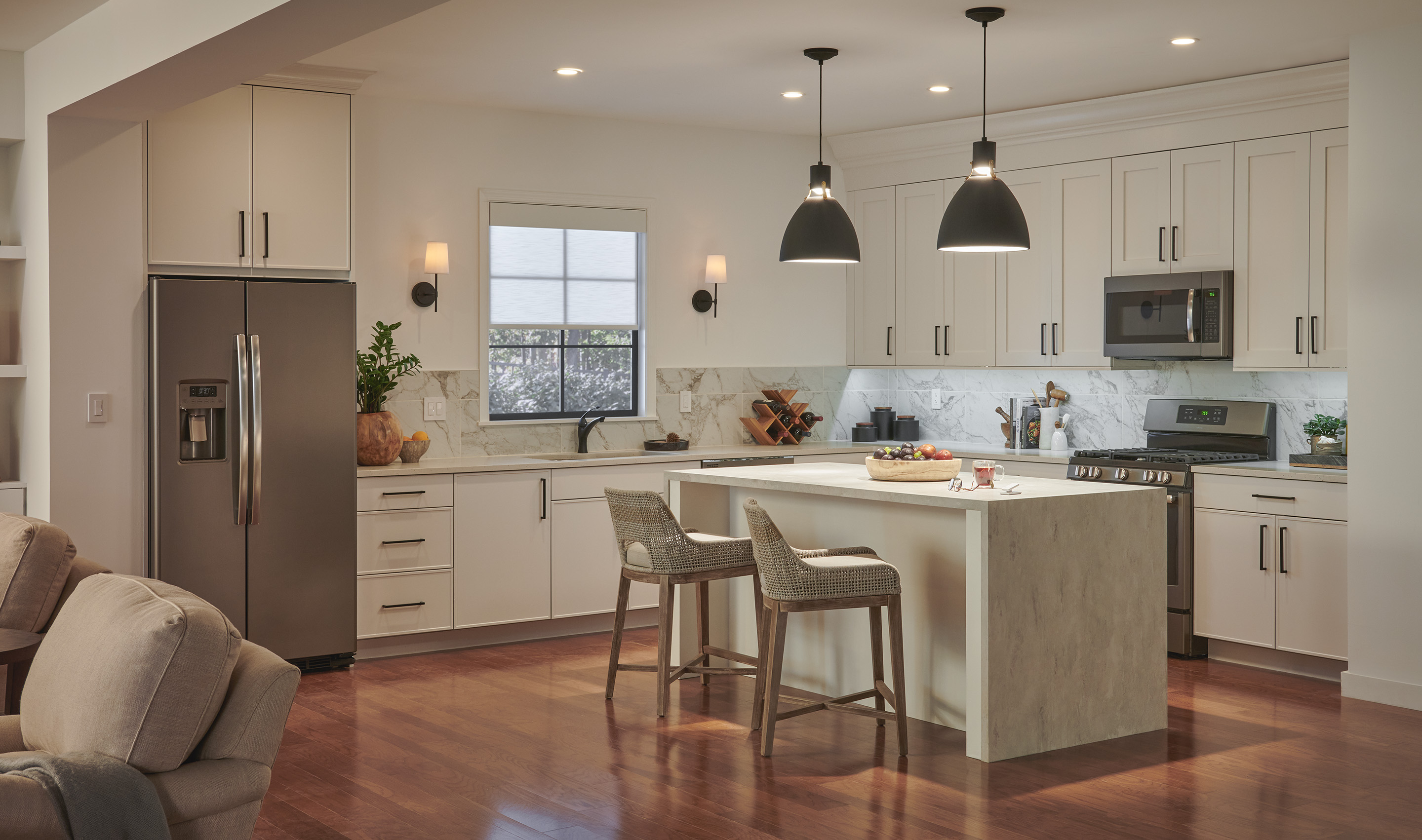 A Northeast private residence kitchen with Lutron Serena, Roller Shades, Caséta & Dimmers & Switches