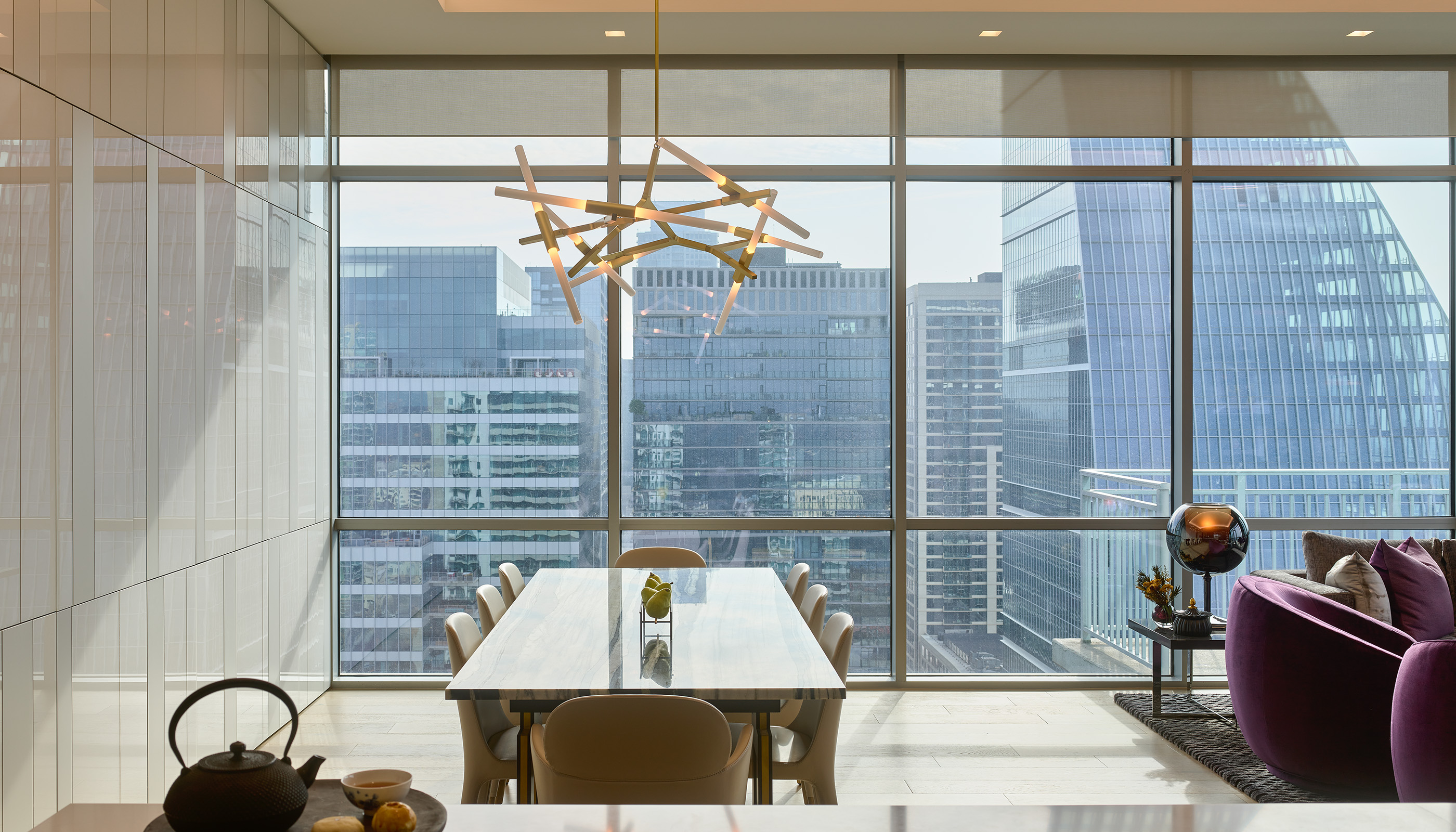 An Austin residential kitchen with Lutron Ketra lights, Palladiom roller shades, and Picos.