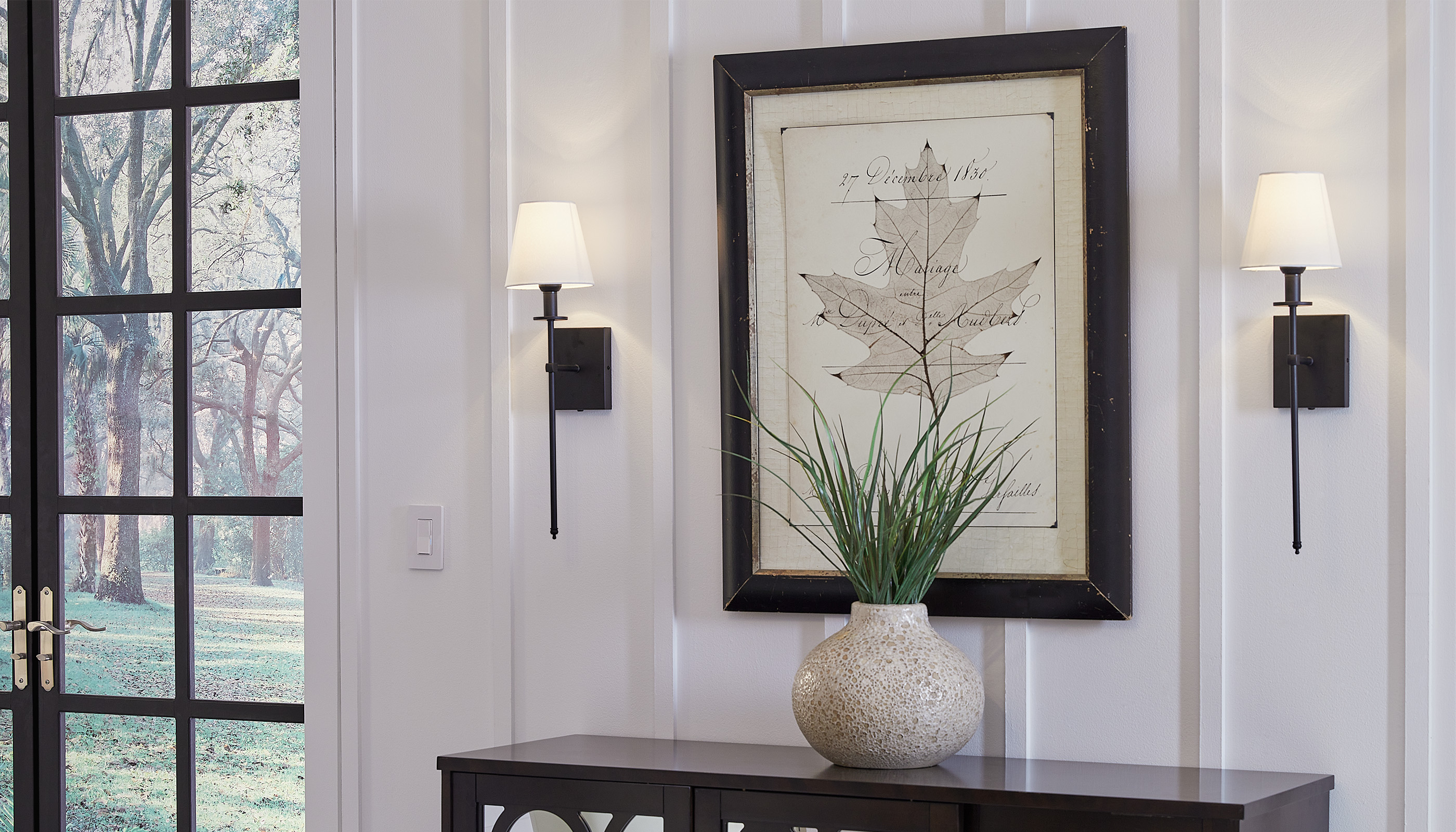 A Southeast private residence hallway  with Lutron Caséta & Dimmers & Switches