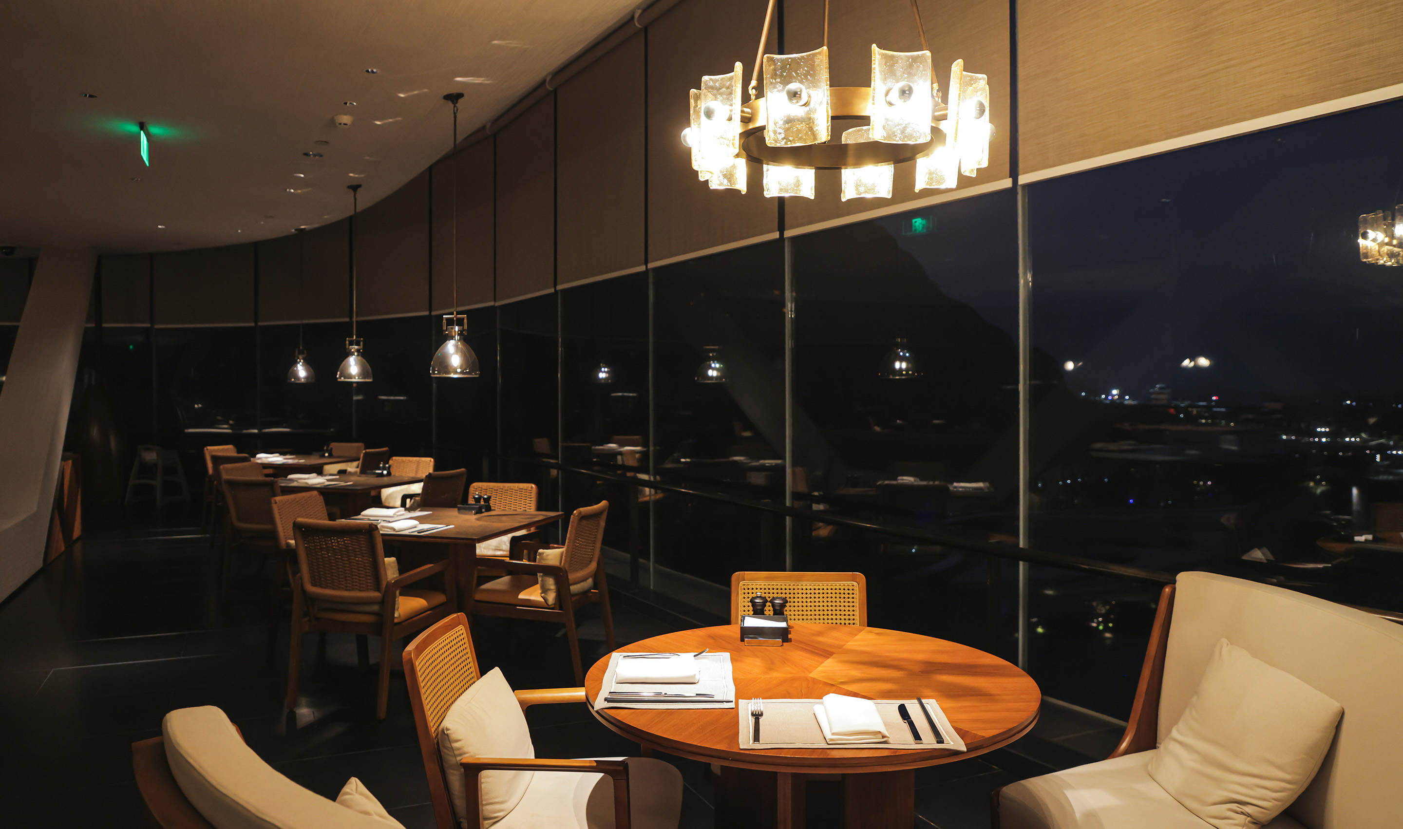 A China hospitality dining & social space with Lutron roller shades.
