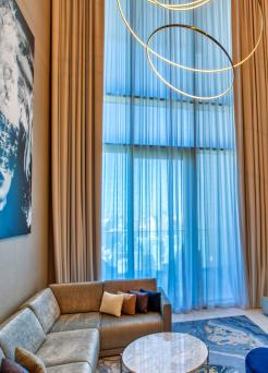 living-room-sls-dubai-sheer-drapes-closed-homepage