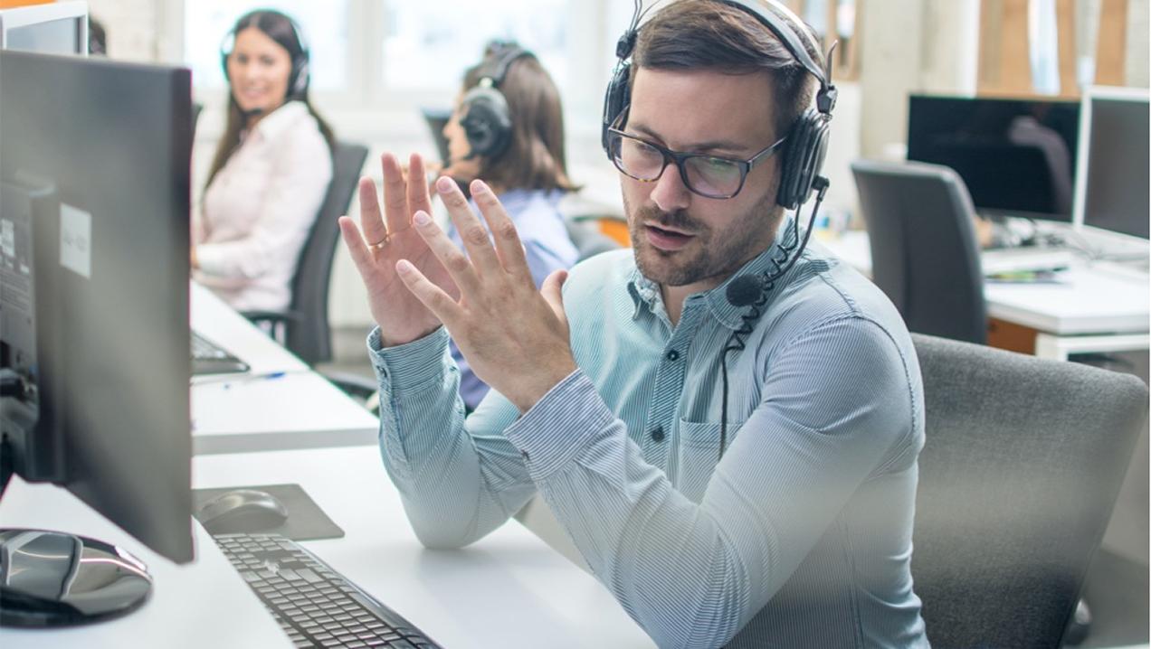 A room of customer service techs on the phone supporting customers.
