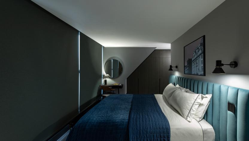 High-end light solutions used in a bedroom setting.