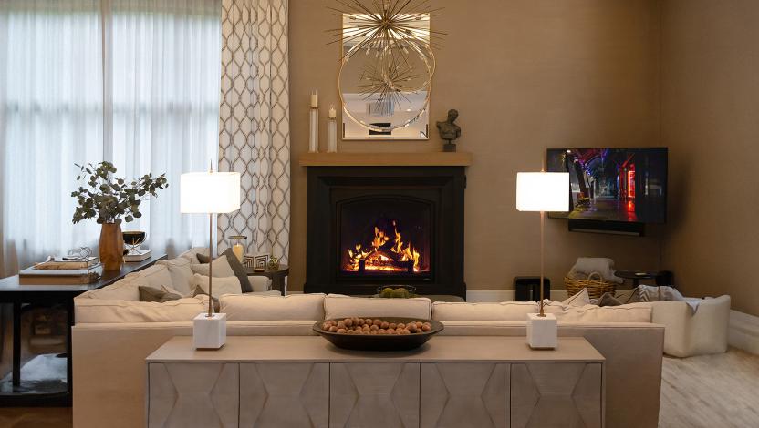 Modern living room featuring RadioRA 3 wireless control for dimmers switches and shades
