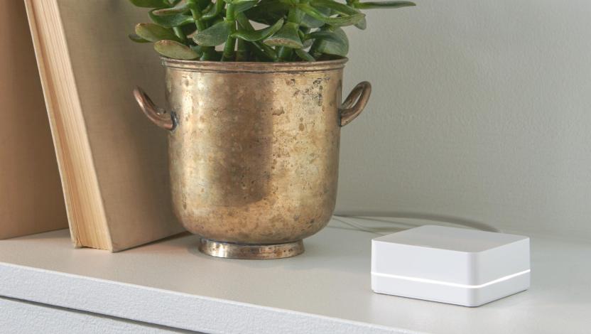 Caseta hub discreetly sitting on a bookshelf.
