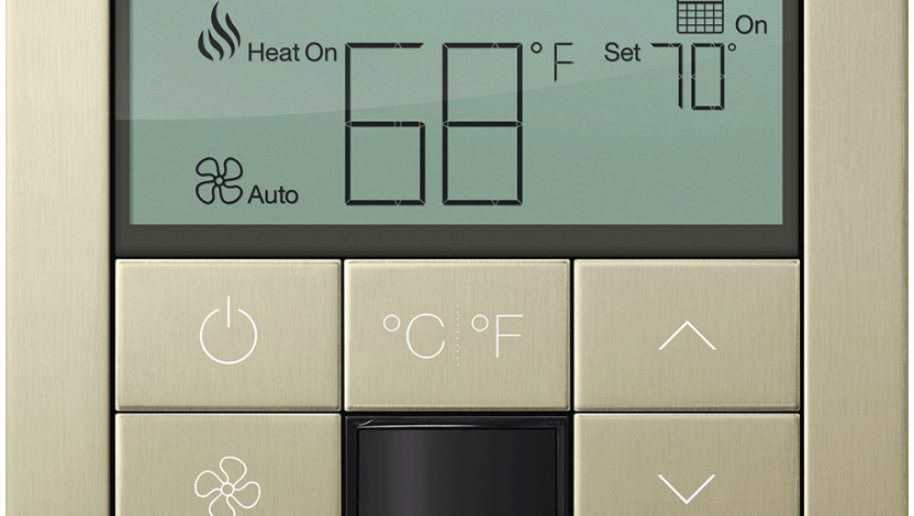 Premium thermostat with metal finishes matching Palladiom architectural controls.