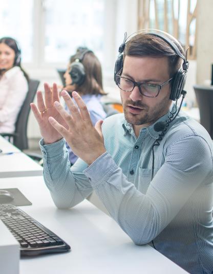 man-at-computer-talking