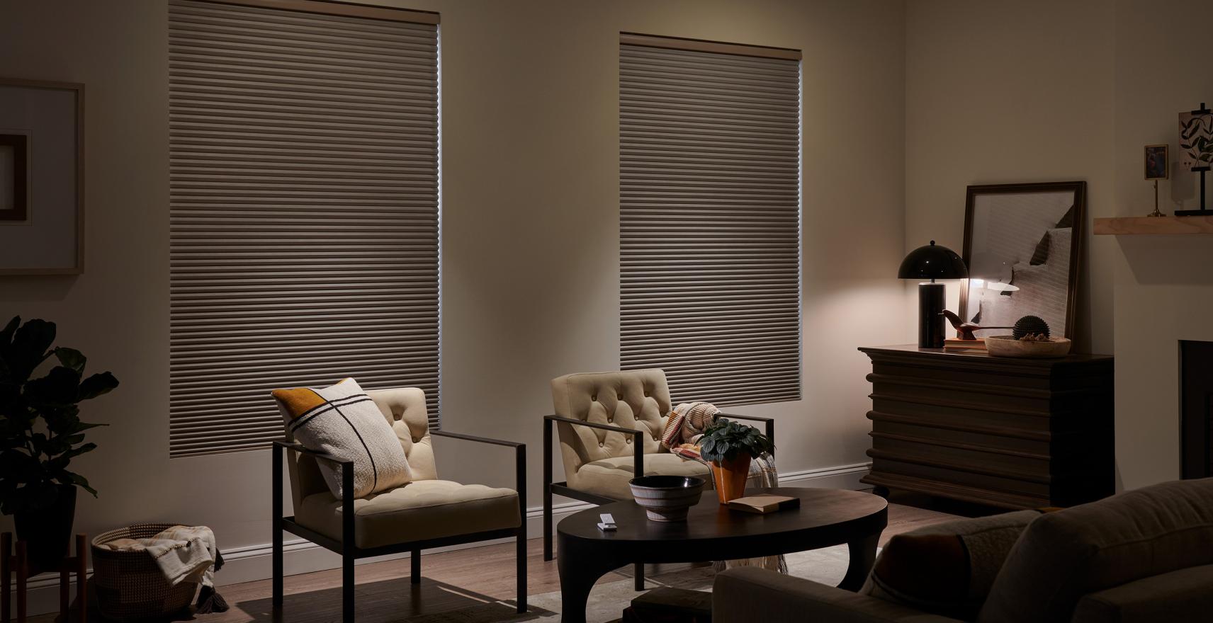 A living room featuring performance shades with blackout technology, blocking heat and glare