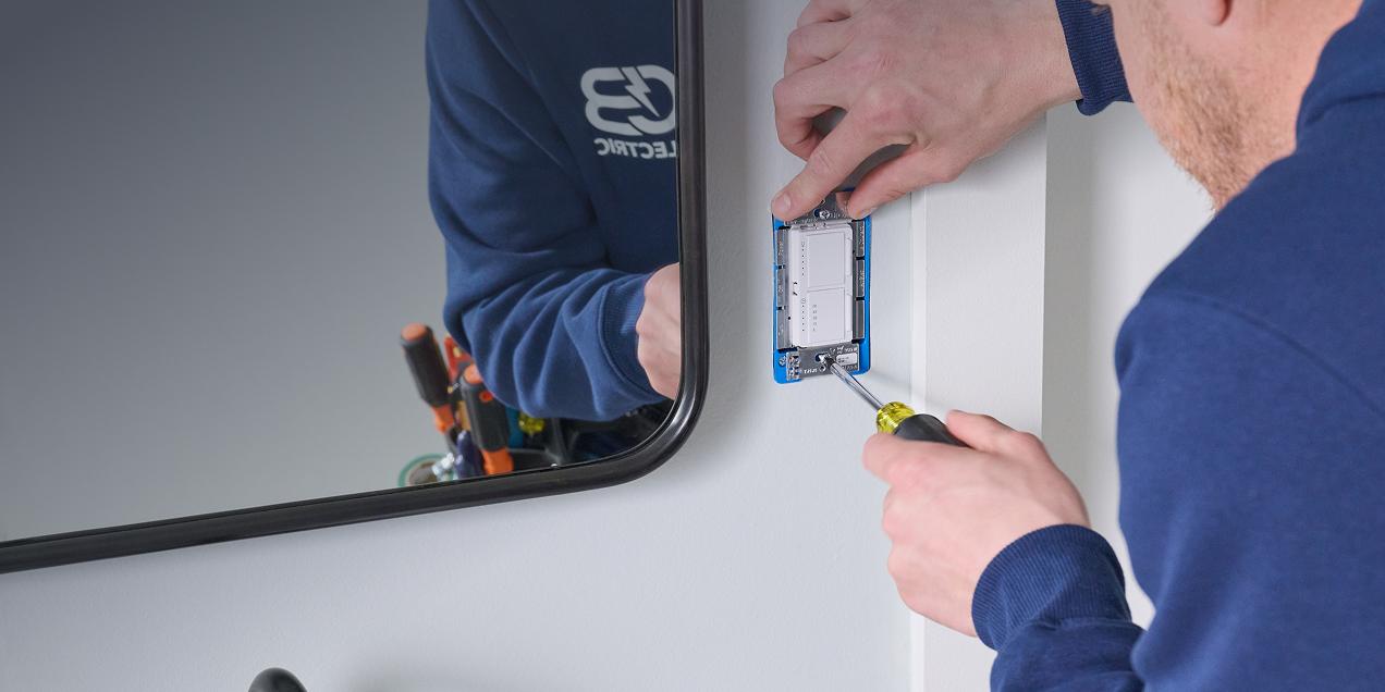 A contractor installing a wallbox.
