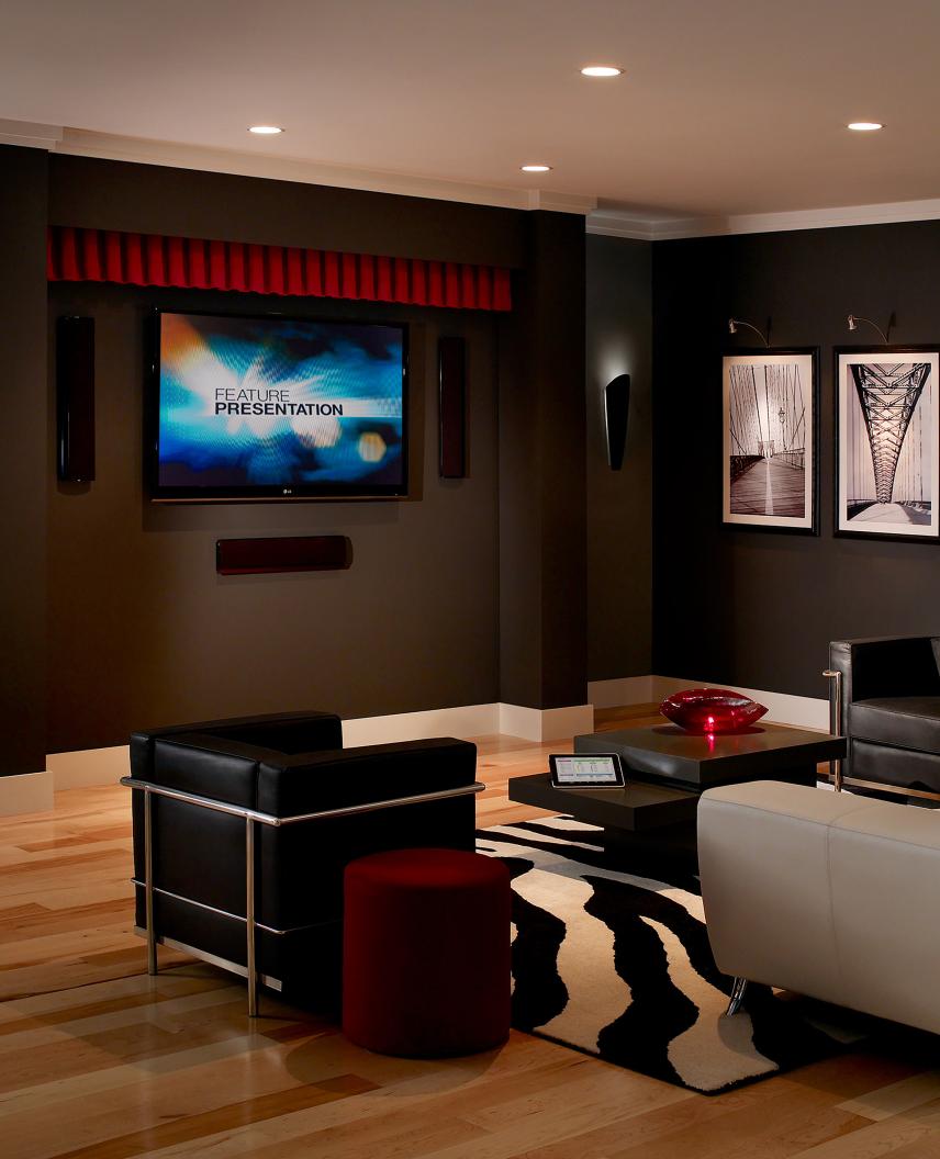 HomeWorks automated home theater with preset lighting scenes and automated shade control.