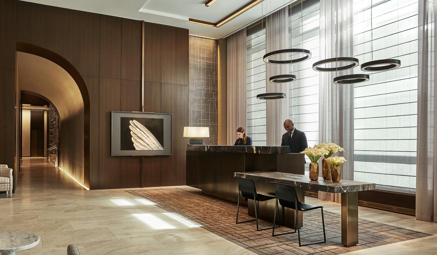  Hotel lobby with responsive lighting that syncs to time of day, supporting ambiance and operations across shared spaces 