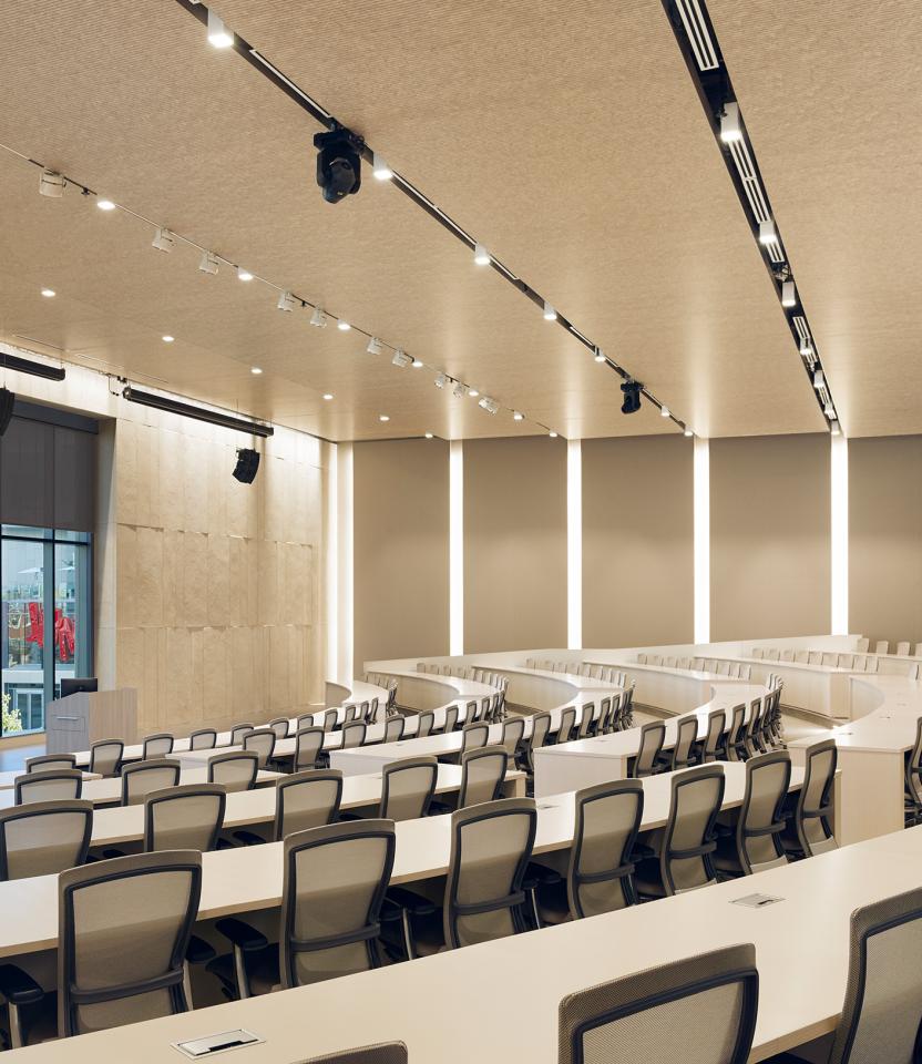 A Boise commercial auditorium with Lutron roller shades.