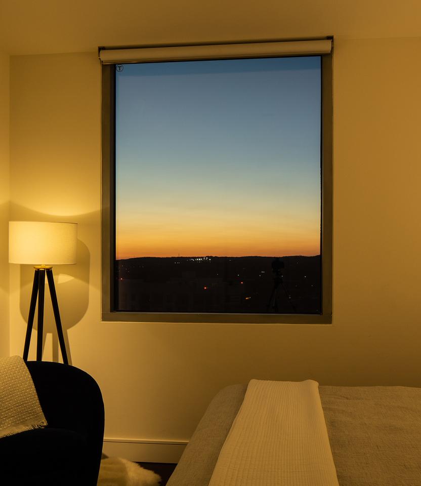 An Austin residential bedroom with Lutron Ketra lights, Palladiom and HomeWorks