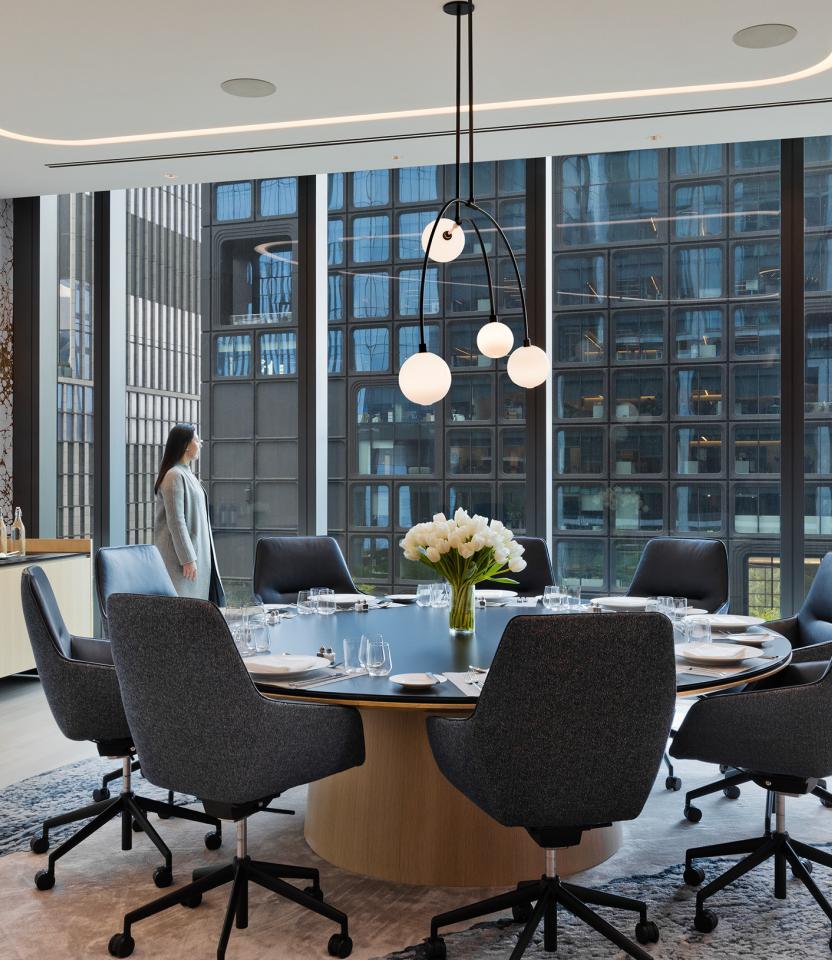 A New York City commercial meeting room with Lutron embedded fixture technology and Athena.