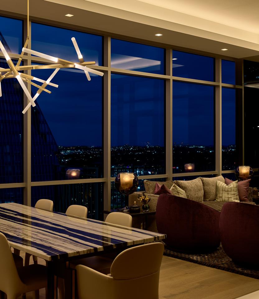An Austin residence dining room with Lutron Ketra lights, linears, Palladiom & HomeWorks