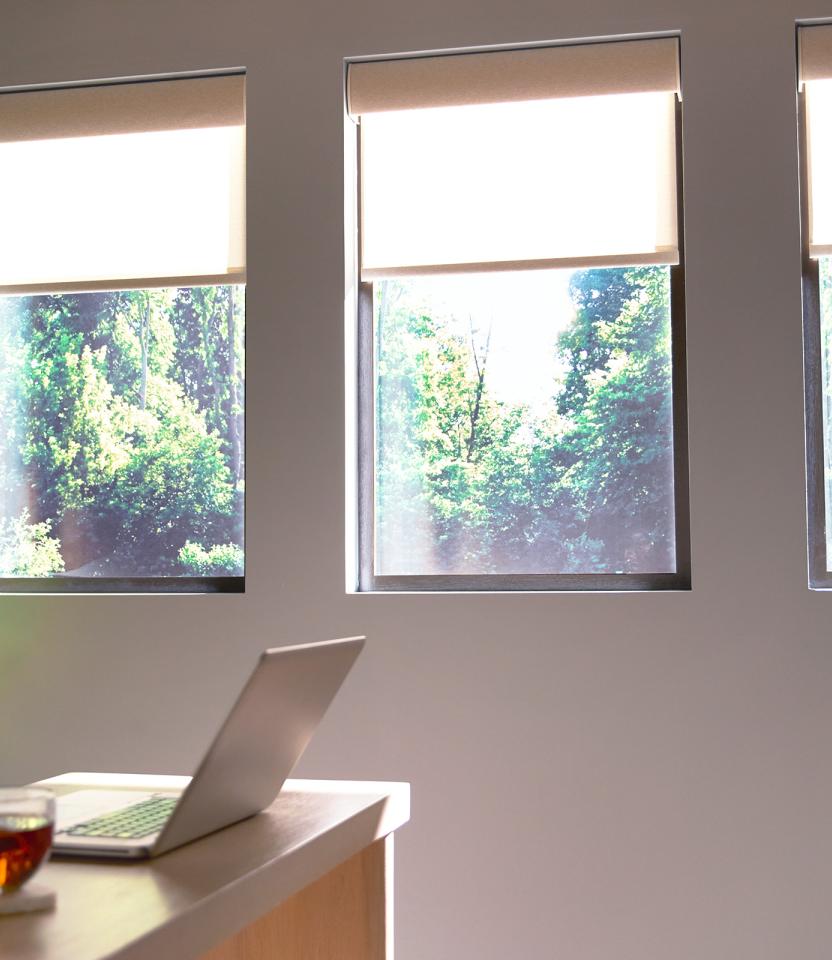 A Northeast private residence homeoffice with Lutron Serena & Honeycomb Shades