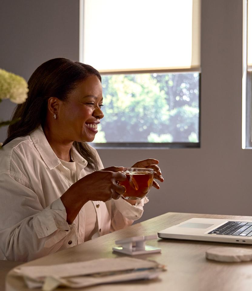 A Northeast private residence homeoffice with Lutron Serena, Roller shades  & Pico
