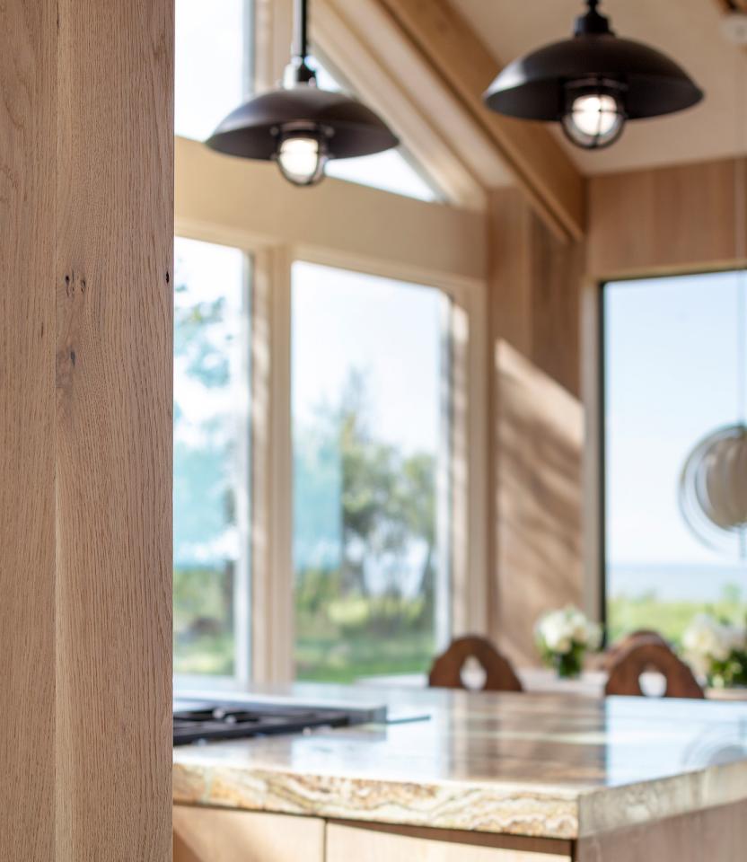 An East Hampton residential kitchen with Lutron Alisse keypads and HomeWorks. © Magda Biernat Photography