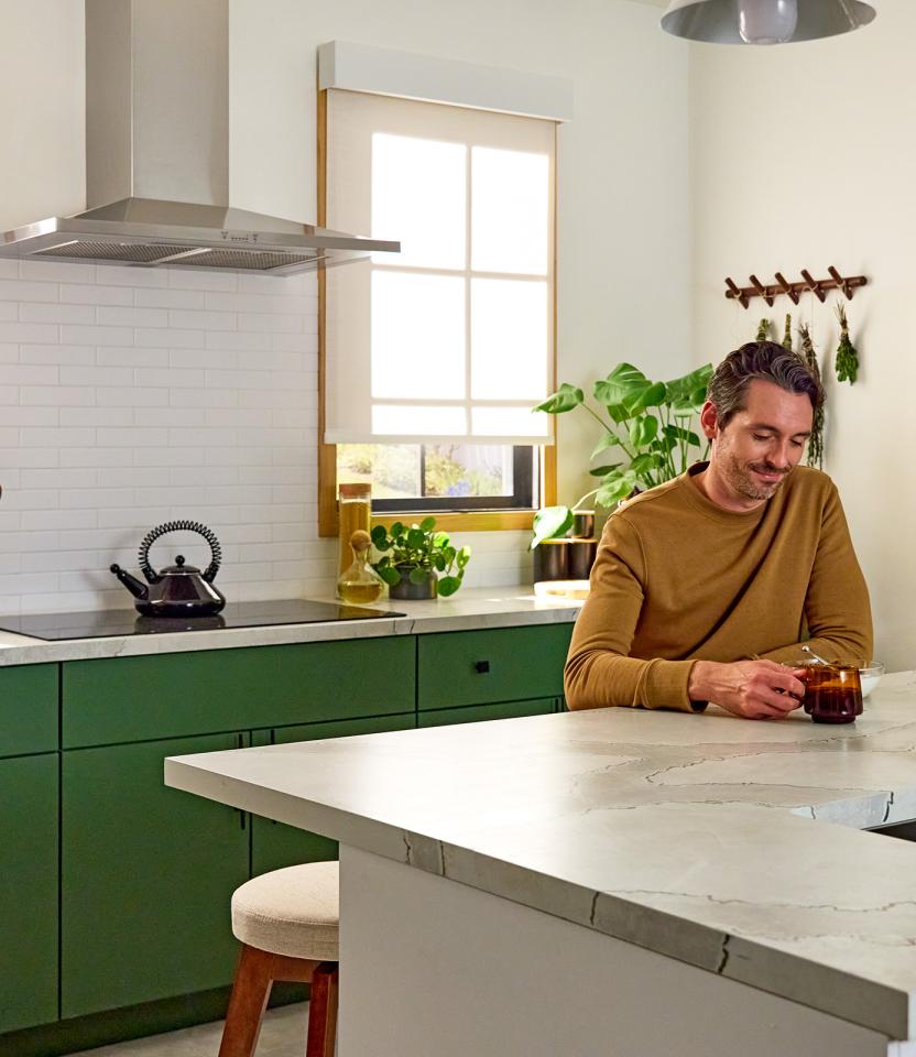 A Northeast private residence kitchen with Lutron Serena, Roller Shades
