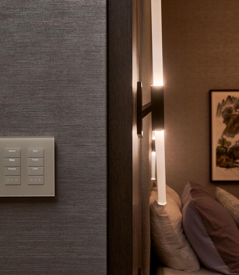 An Austin residential bedroom with Lutron Alisse, Keypads &  HomeWorks