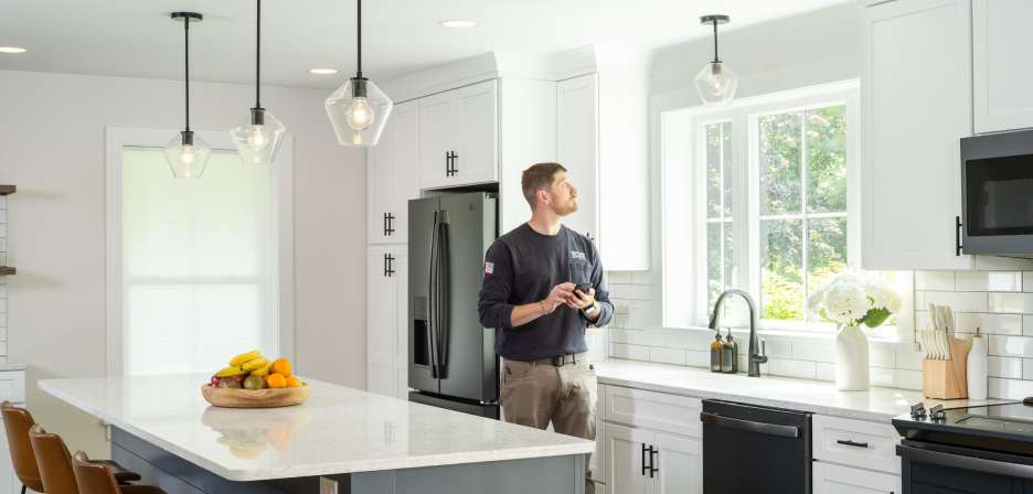 Lutron Pro Installer uses their smartphone to connect lights to the Lutron app.