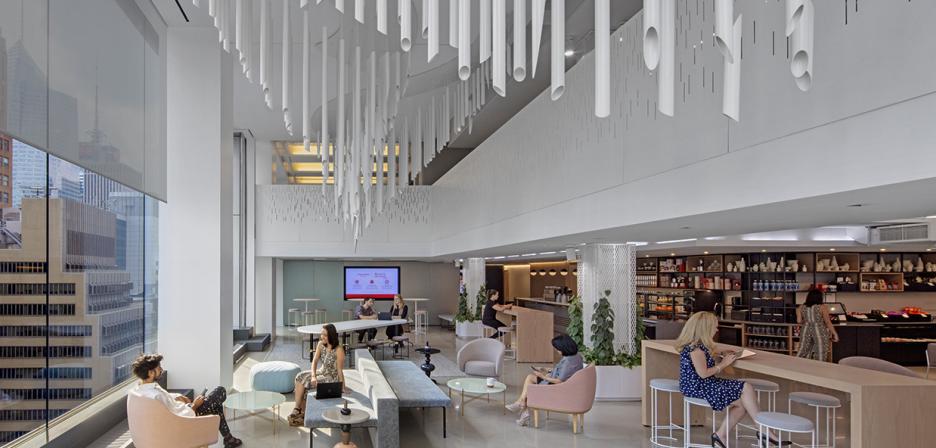 Employees at Shiseido's office use Lutron automated shades to let the light in while avoiding glare.