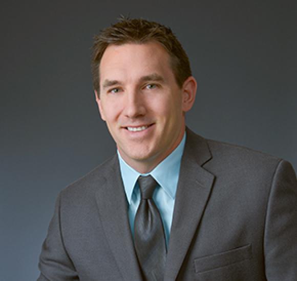 A headshot of Lutron's Brent Protzman