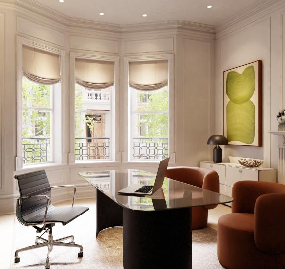 Home office with automated shades that minimize glare and solar heat gain, paired with dynamic white lighting.