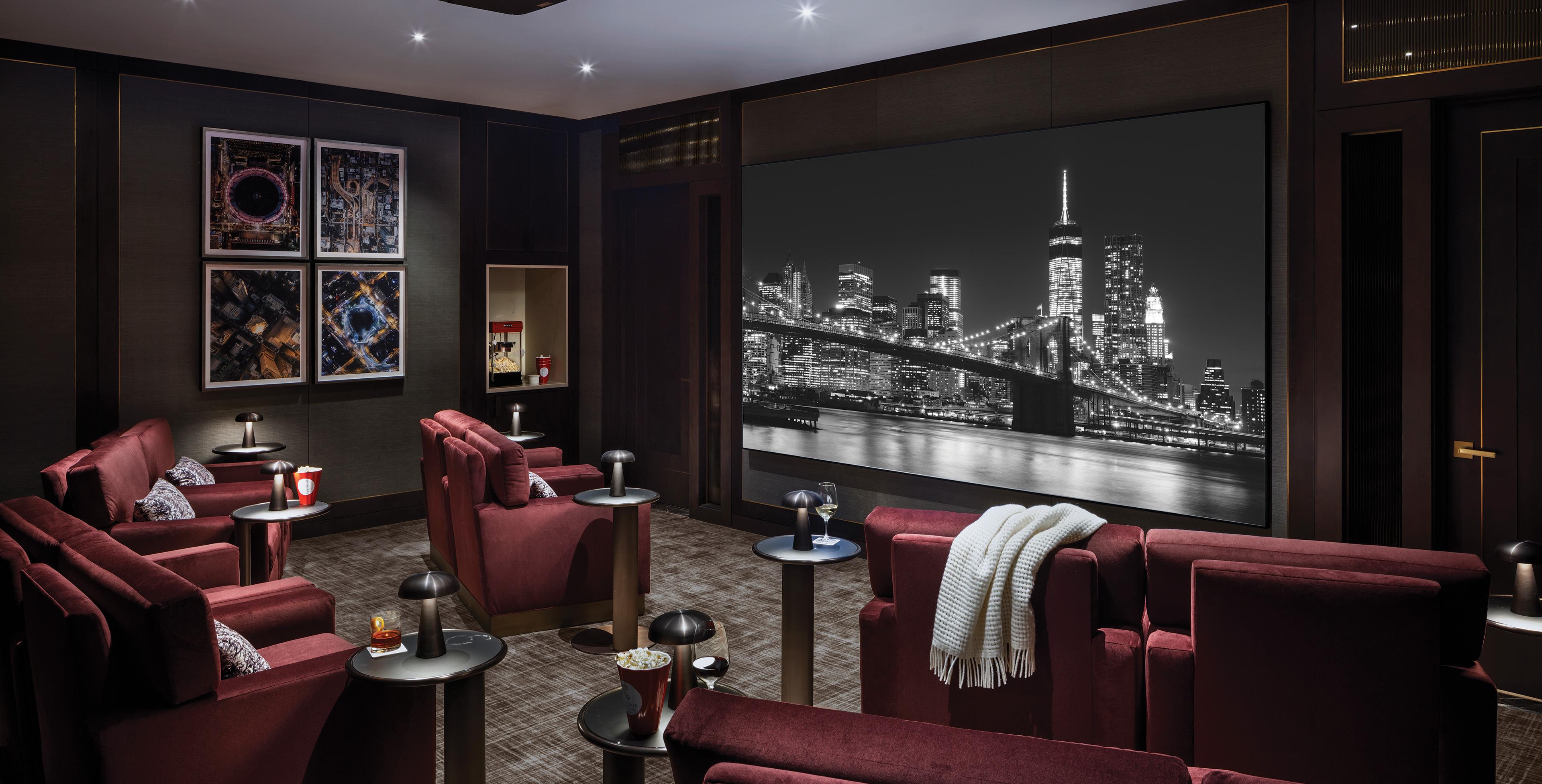 HomeWorks Movie Night scene  in a luxury home theater with automated lighting