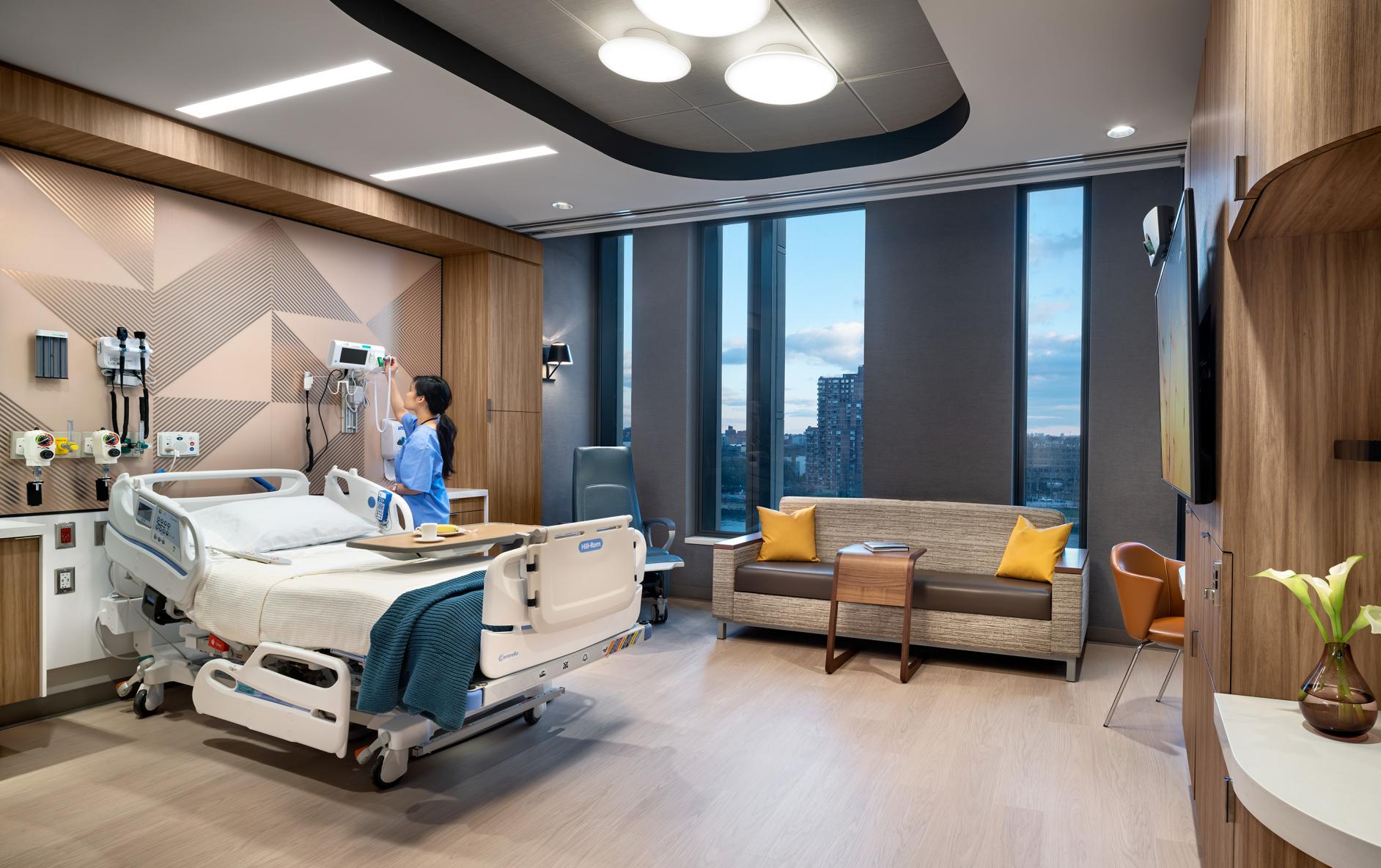 patient-room-msk-koch-building-cc-nurse-at-Machine