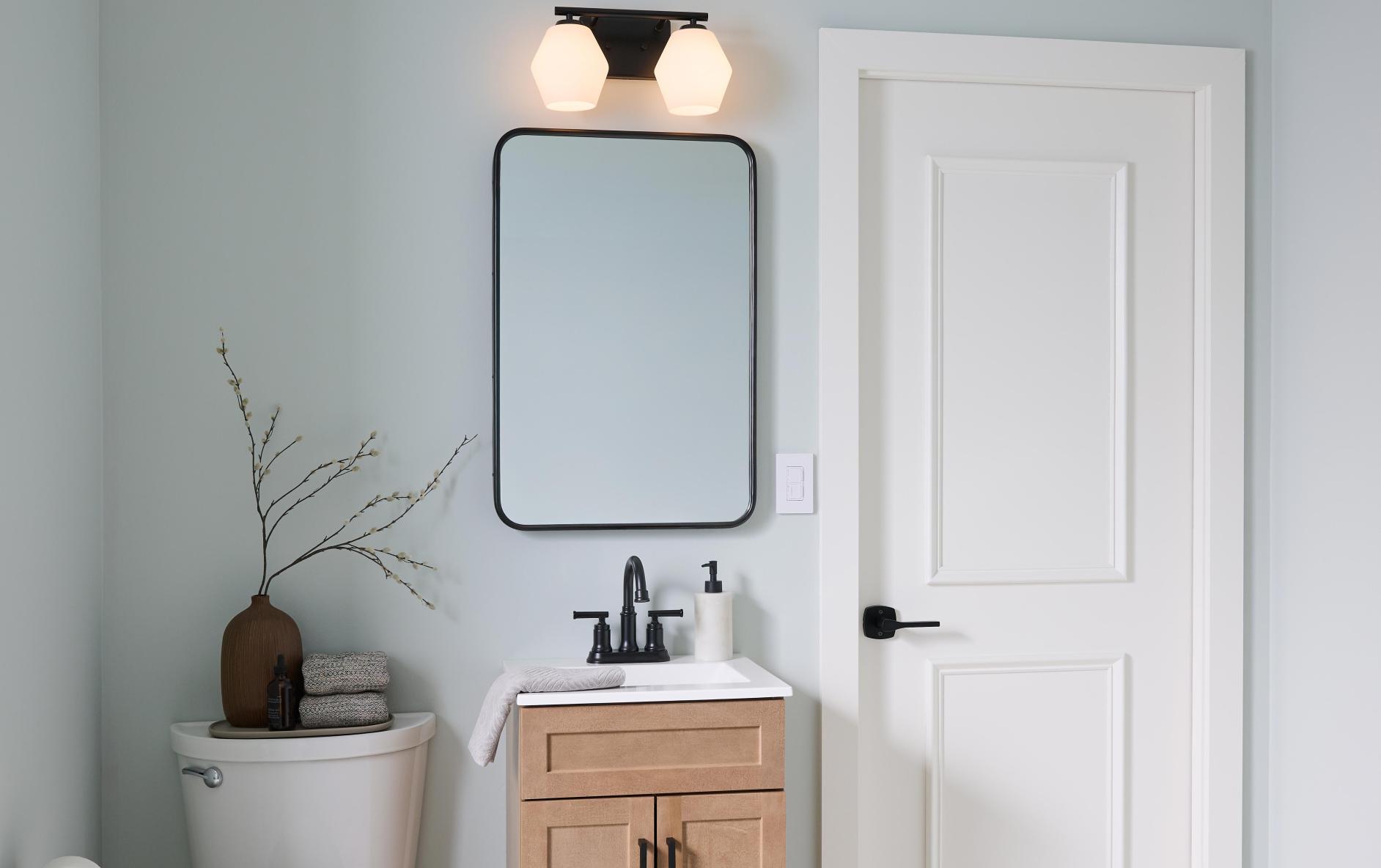 A bathroom featuring the dual dimmer and timer switch.