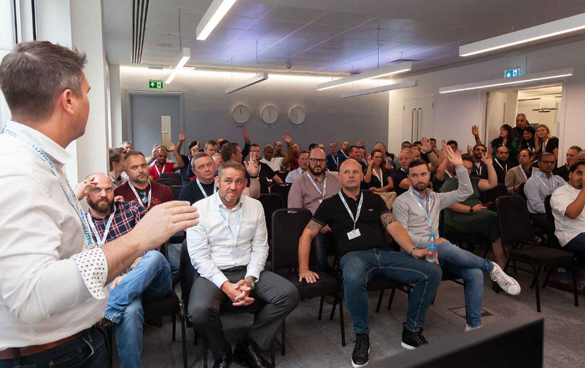 Professionals are together at a conference learning and networking.