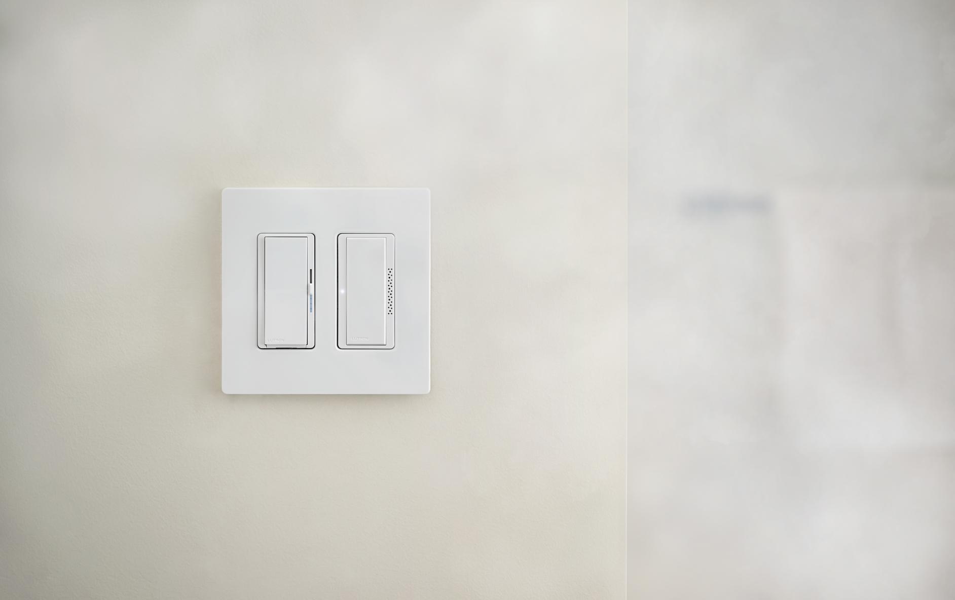 Close up of a Lutron Humidity Sensor and Diva Dimmer with Night Mode.