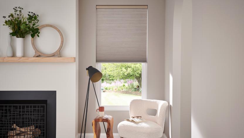 Lutron architectural honeycomb shades in a living room